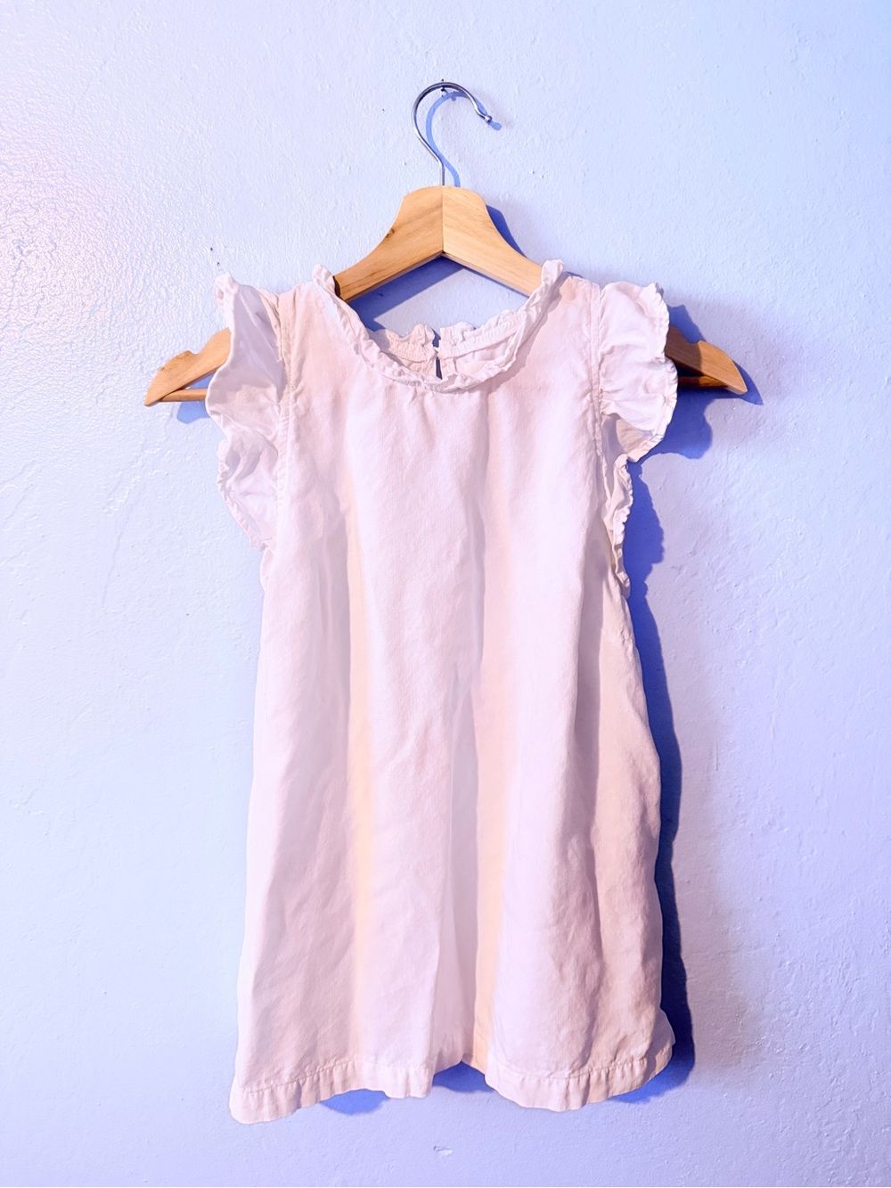 Anthropologie’s cloth & stone Classic Ruffle Sleeve Blouse